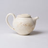 Yuko Matsuzuka, Round teapot in cream glaze flecked with ochre