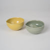 Bowl with pouring lip in olive green glaze & yello