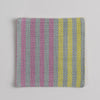 Hand woven cotton coaster - yellow & pink, front