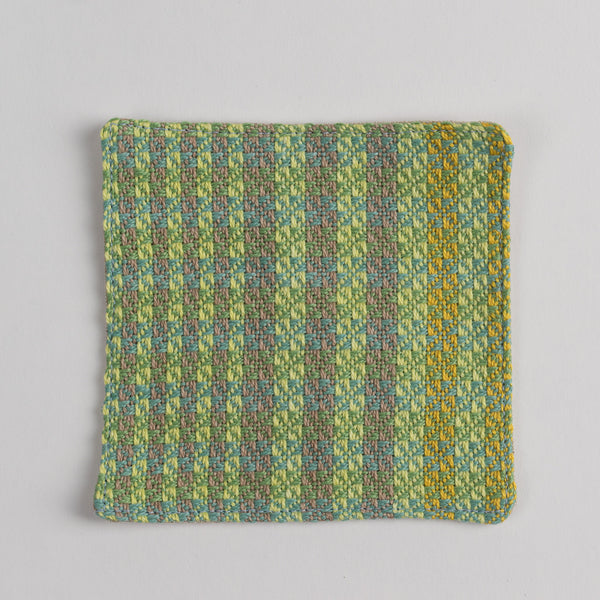 Hand woven cotton coaster - green & brown, front