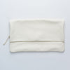 Clutch leather bag in white, flat