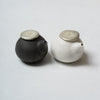 Katsufumi Baba, Sauce cruet in matt white finish & black glaze with pewter lid