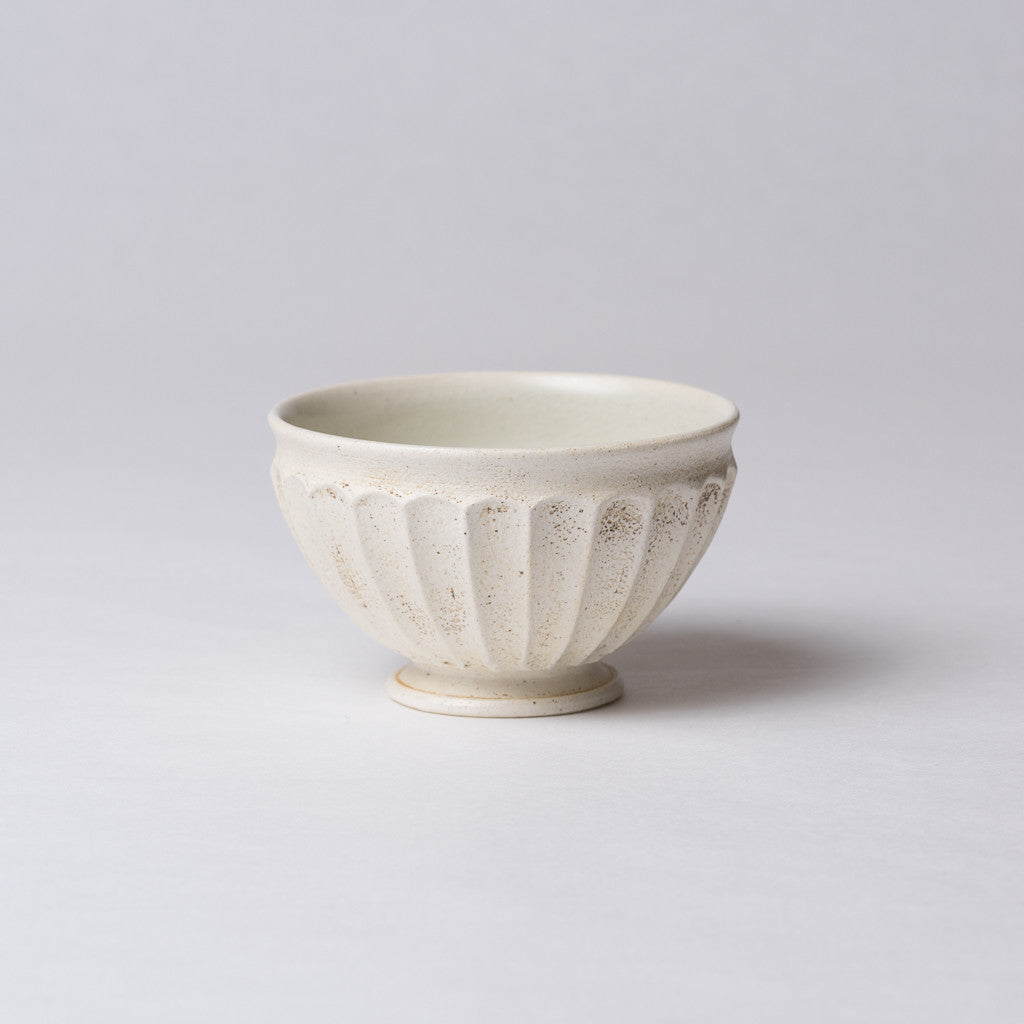 Yuko Matsuzuka, Round bowl in cream glaze flecked with ochre