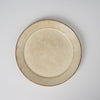 Round plate in cream ash glaze