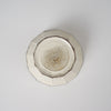 Small bowl with wide flutes in off-white glaze, back 2