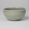 Bowl with pouring lip in olive green glaze