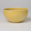 Bowl with pouring lip in yellow glaze