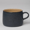 Mug in mat dark blue-gray and natural red clay