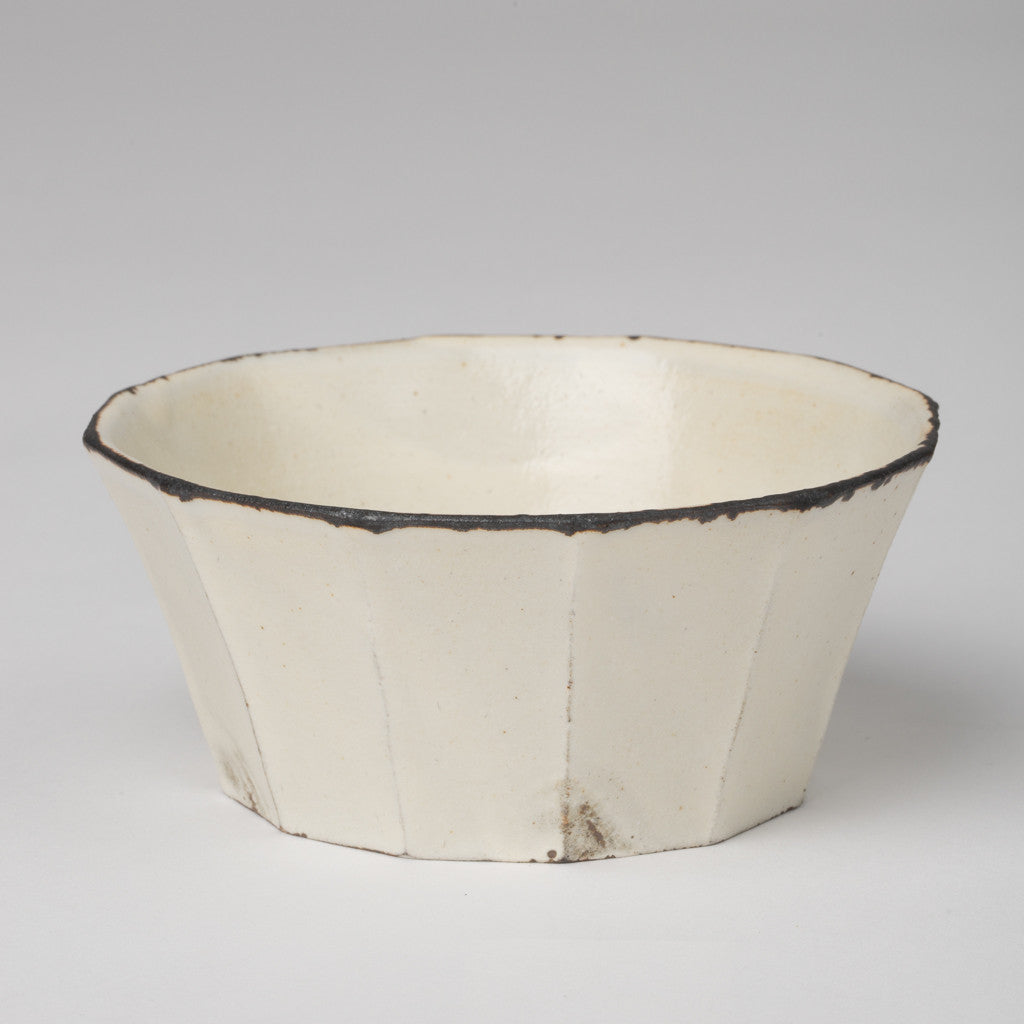 Small bowl with wide flutes in off-white glaze
