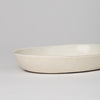 Oval dish with off-white glaze