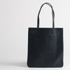 Leather tote bag in navy, front