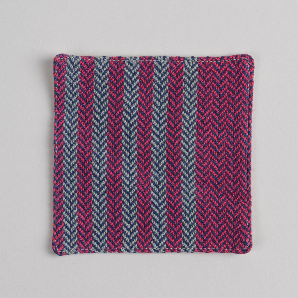 Hand woven cotton coaster - pink & violet, front